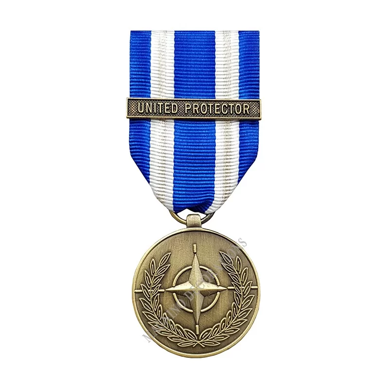 MEDAILLE OTAN UNITED PROTECTOR - 110595 - Achetez votre MEDAILLE OTAN UNITED PROTECTOR - Magnino Décorations - Vente de Médaille